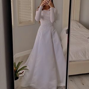 Wedding dress…worn once…in great shape, no rips or tares! Size 4